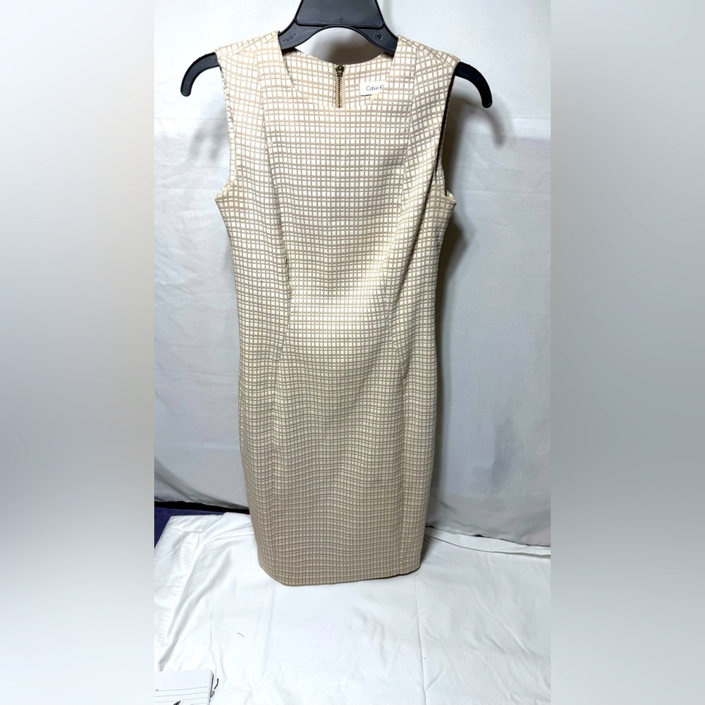 Calvin Klein Elegant Cream Sleeveless Dress.